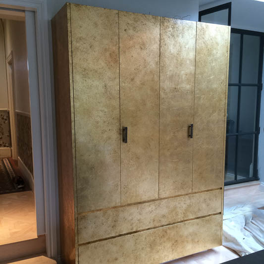 Gold leaf on armoire